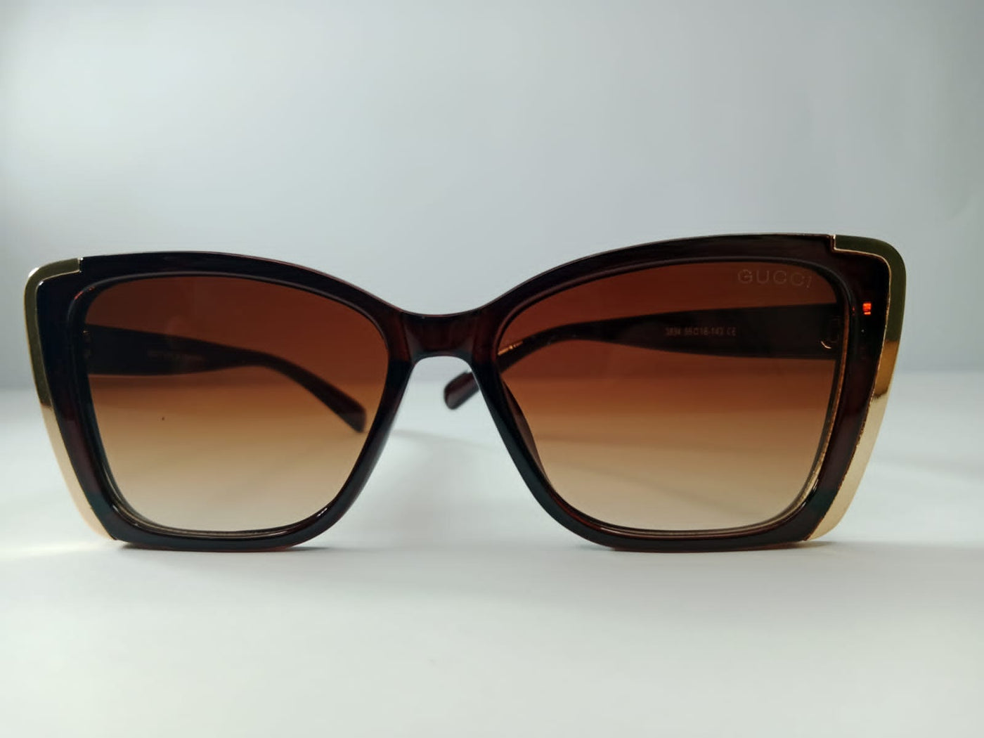 Gucci Oversized Gradient Sunglasses with Gold Accents. For women