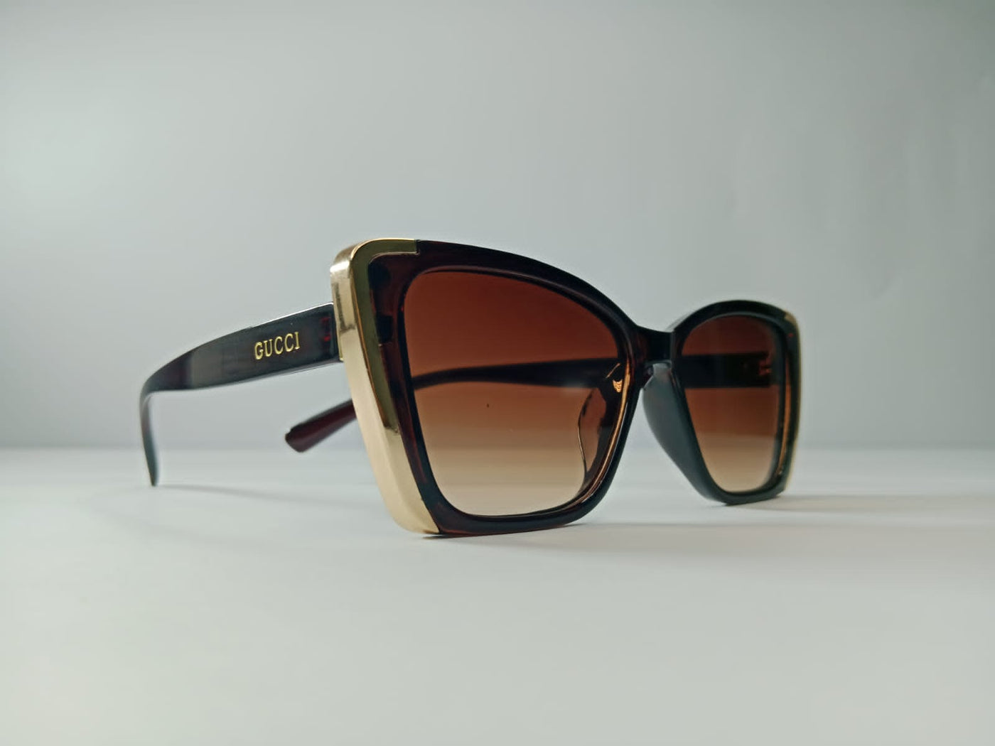 Gucci Oversized Gradient Sunglasses with Gold Accents. For women